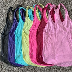 (7) size 6 Lululemon tank tops